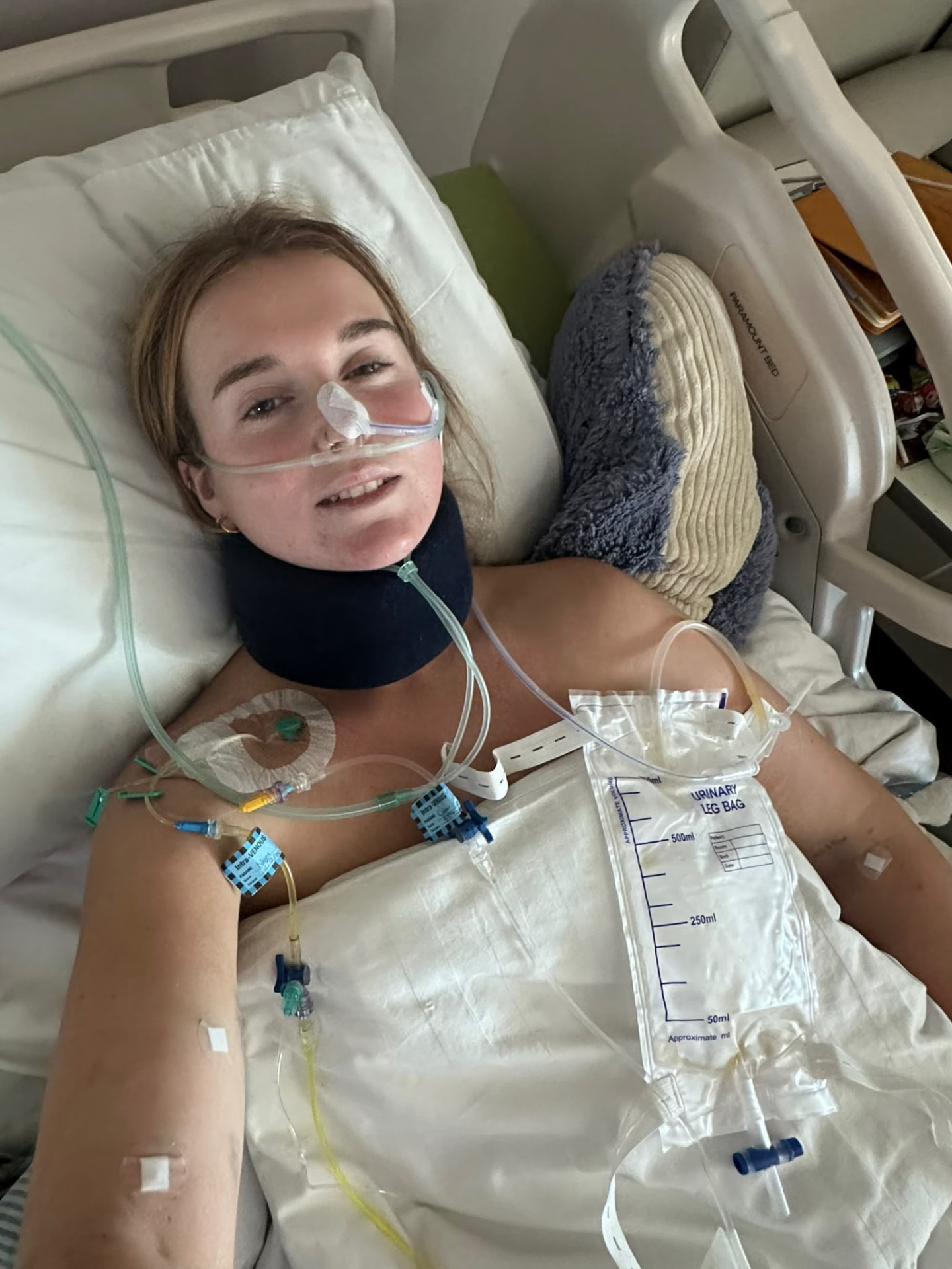 A closer photograph of Georgia lying in her hospital bed