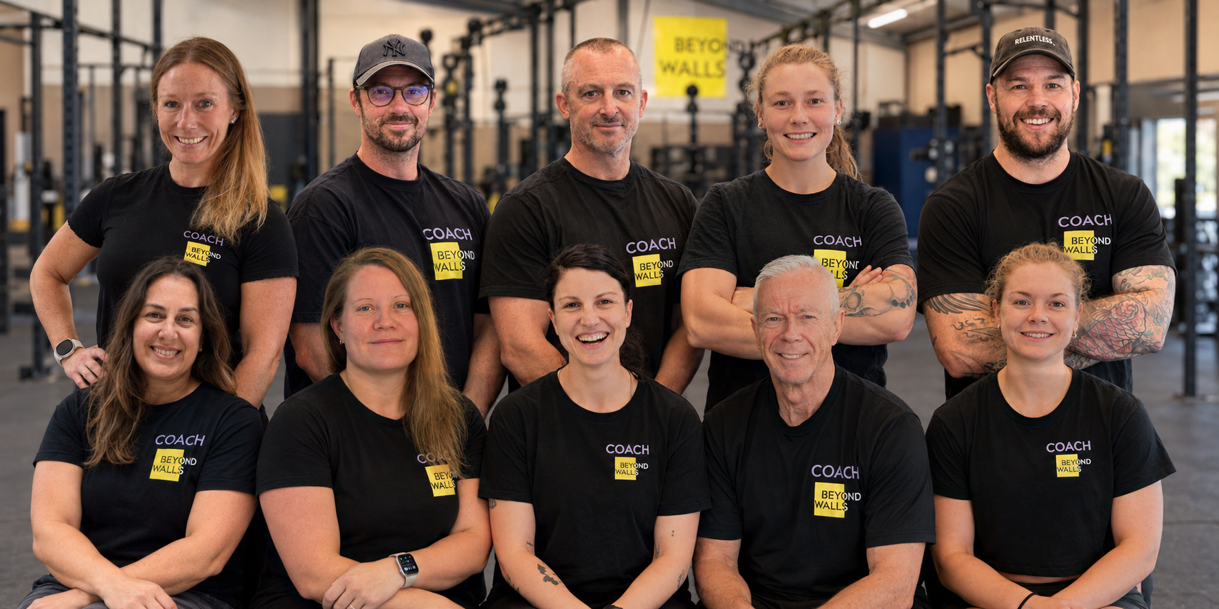 The Beyond Walls coaching team together in the gym